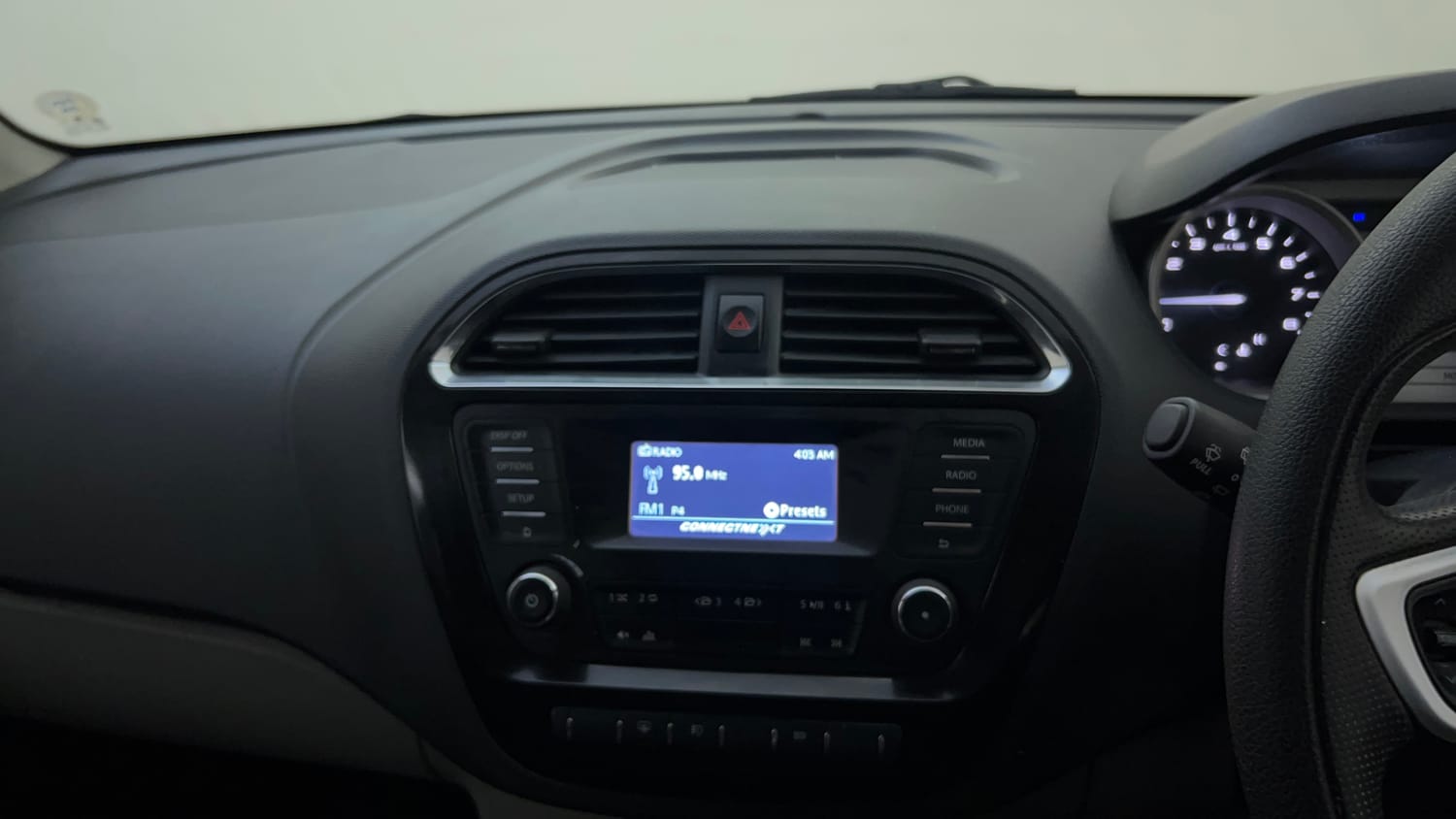 Used 2018 Tata Tiago Revotron XZ Petrol Manual top_features Integrated (in-dash) music system