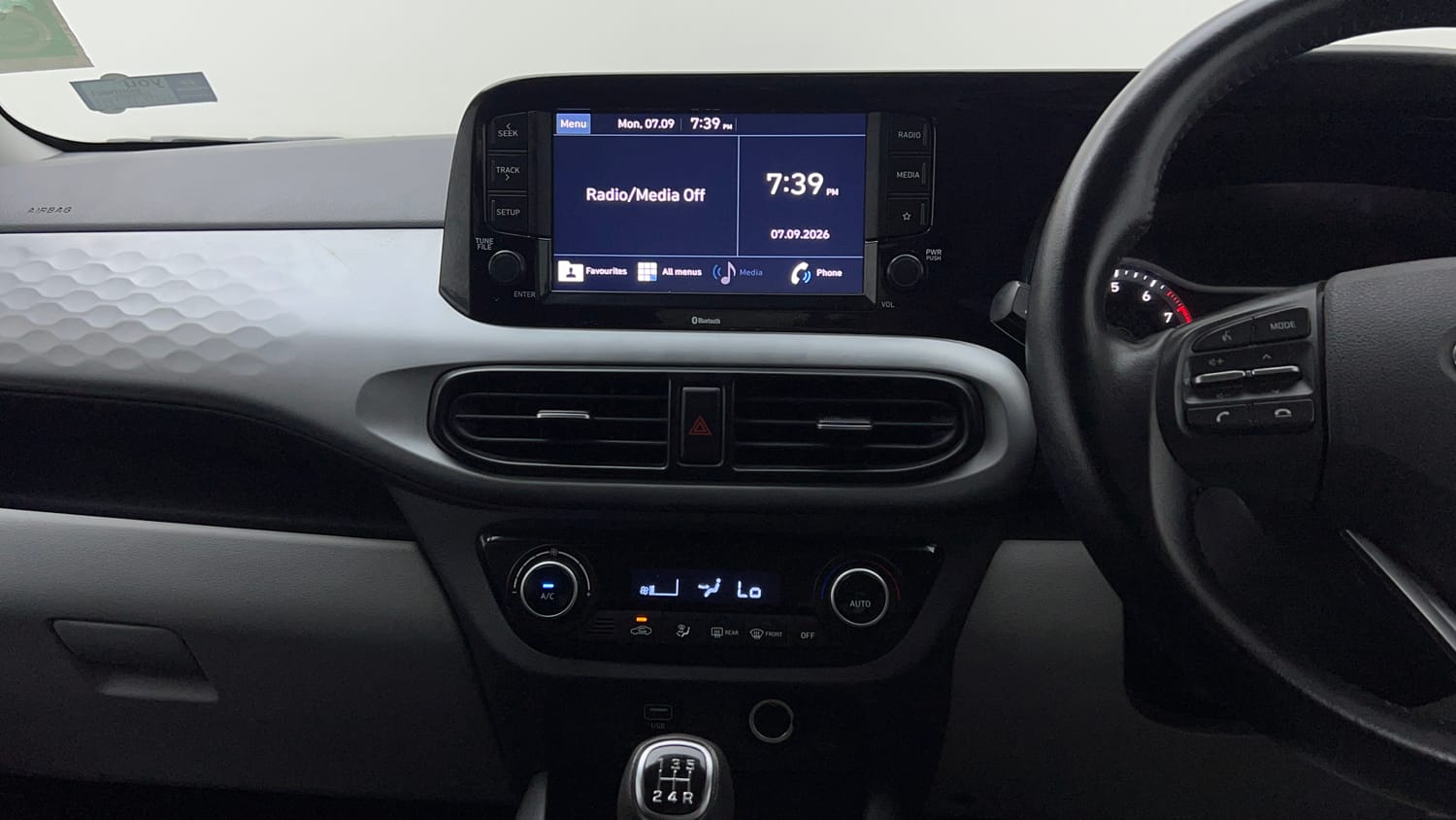 Used 2022 Hyundai Grand i10 Nios Sportz 1.2 Kappa VTVT Petrol Manual interior MUSIC SYSTEM & AC CONTROL VIEW