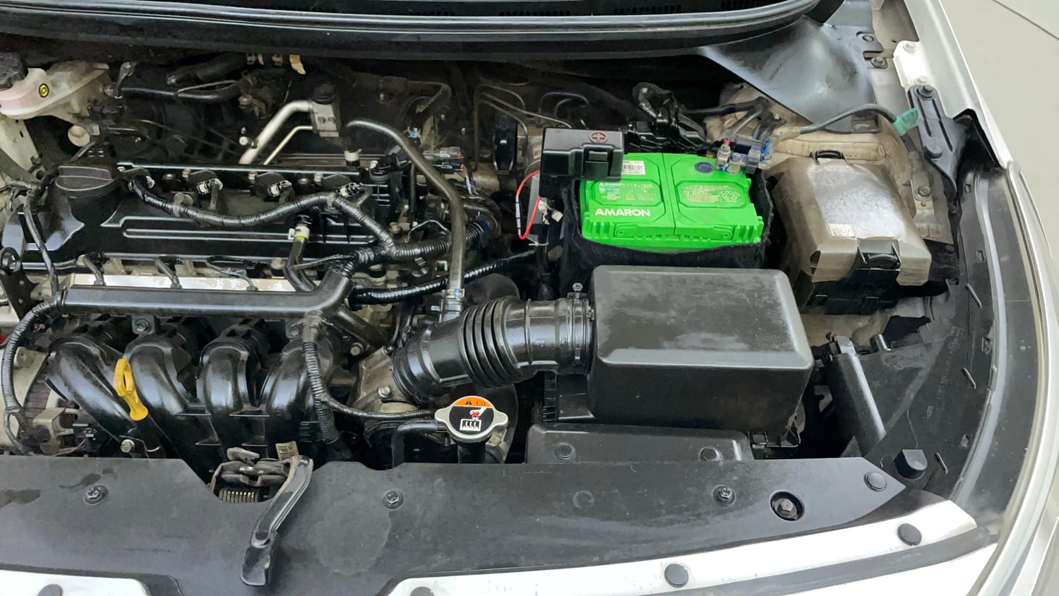 Used 2019 Hyundai Elite i20 Sportz Plus 1.2 Dual Tone Petrol Manual engine ENGINE LEFT SIDE VIEW