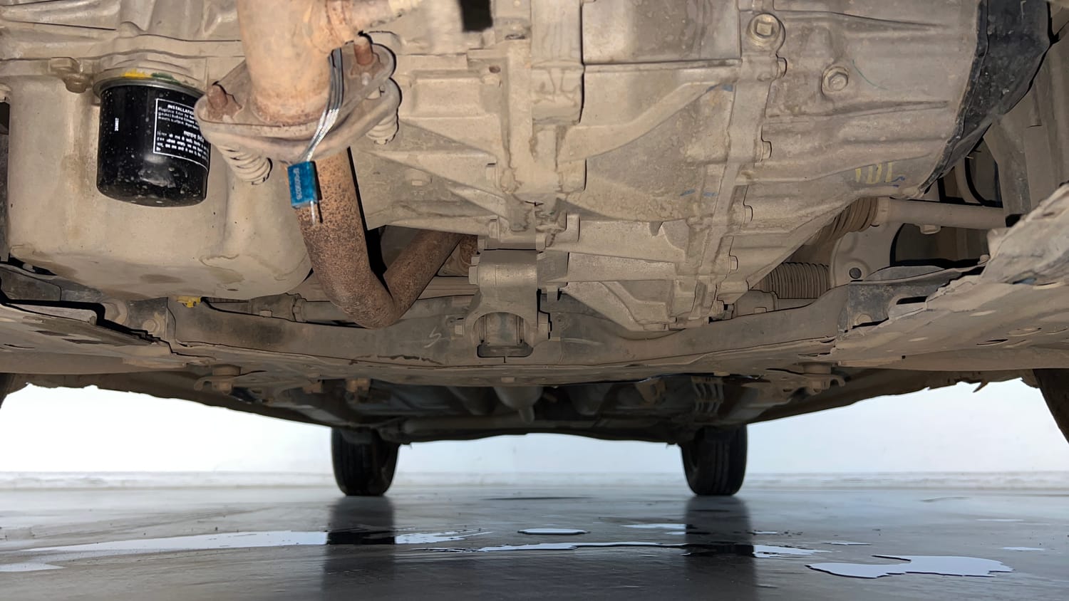 Used 2022 Maruti Suzuki New Ertiga VXi Petrol Manual extra FRONT LEFT UNDERBODY VIEW