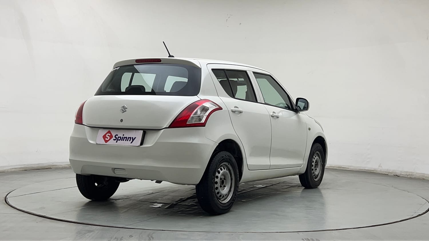 Used 2015 Maruti Suzuki Swift Lxi (O) Petrol Manual exterior RIGHT REAR CORNER VIEW