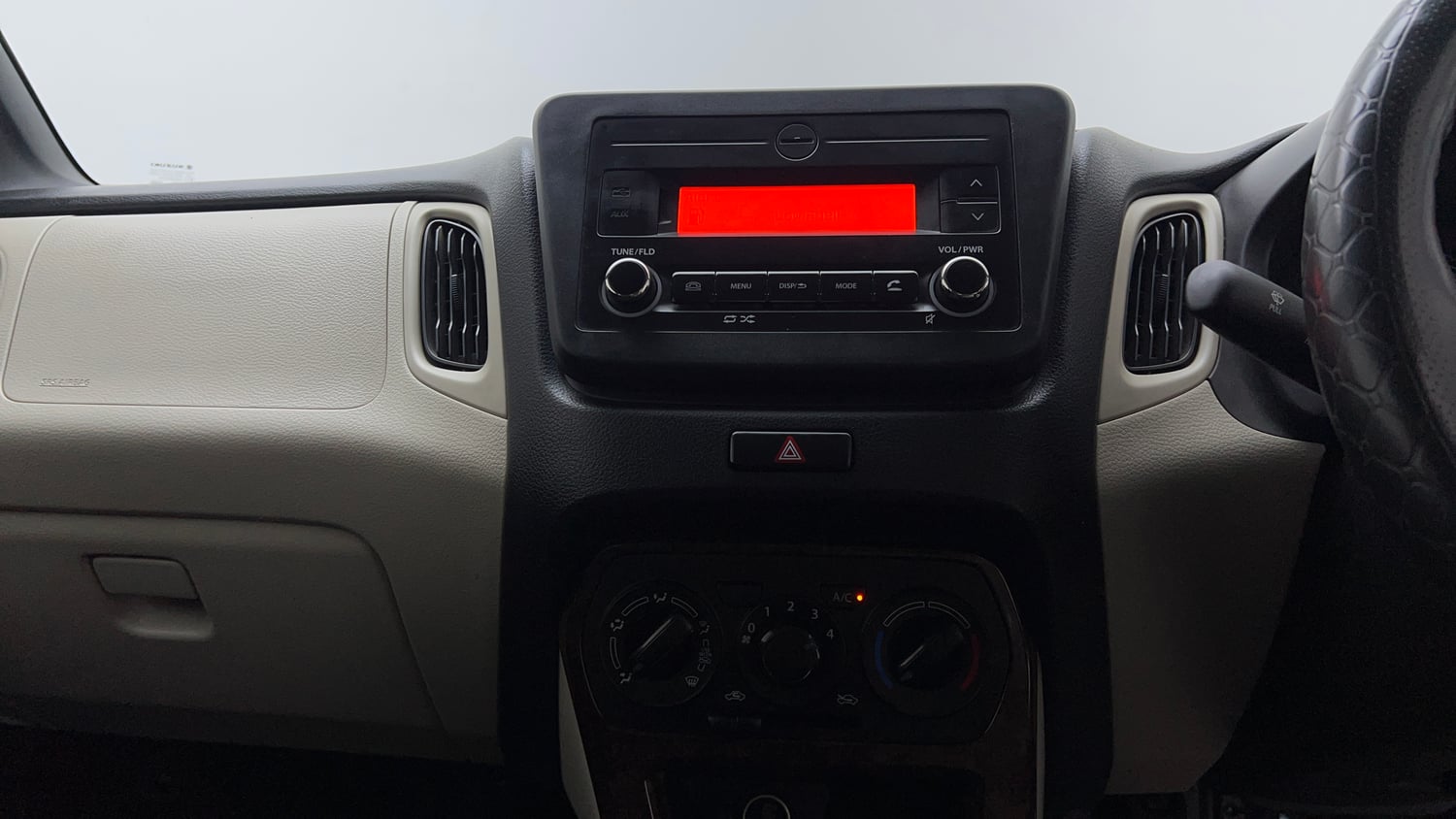 Used 2022 Maruti Suzuki Wagon R VXI 1.0 Petrol Manual top_features Integrated (in-dash) music system