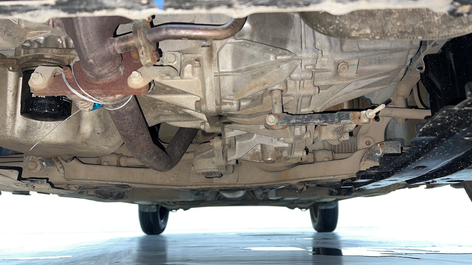 Used 2021 Maruti Suzuki Swift VXi Petrol Manual extra FRONT LEFT UNDERBODY VIEW
