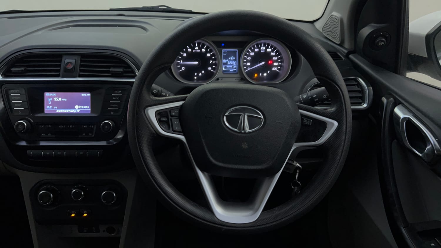 Used 2018 Tata Tiago Revotron XZ Petrol Manual top_features Steering mounted controls