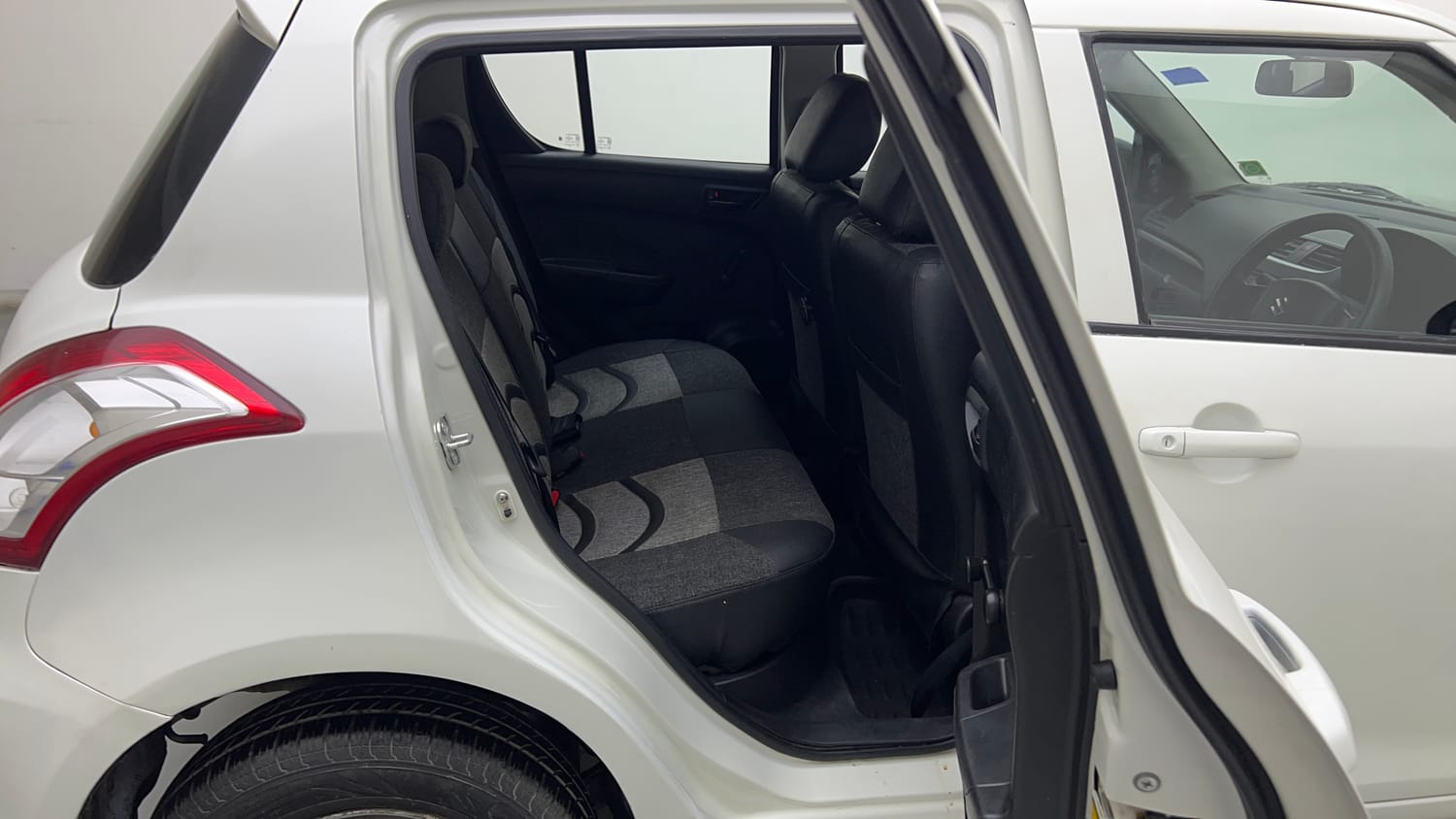 Used 2015 Maruti Suzuki Swift Lxi (O) Petrol Manual interior RIGHT SIDE REAR DOOR CABIN VIEW