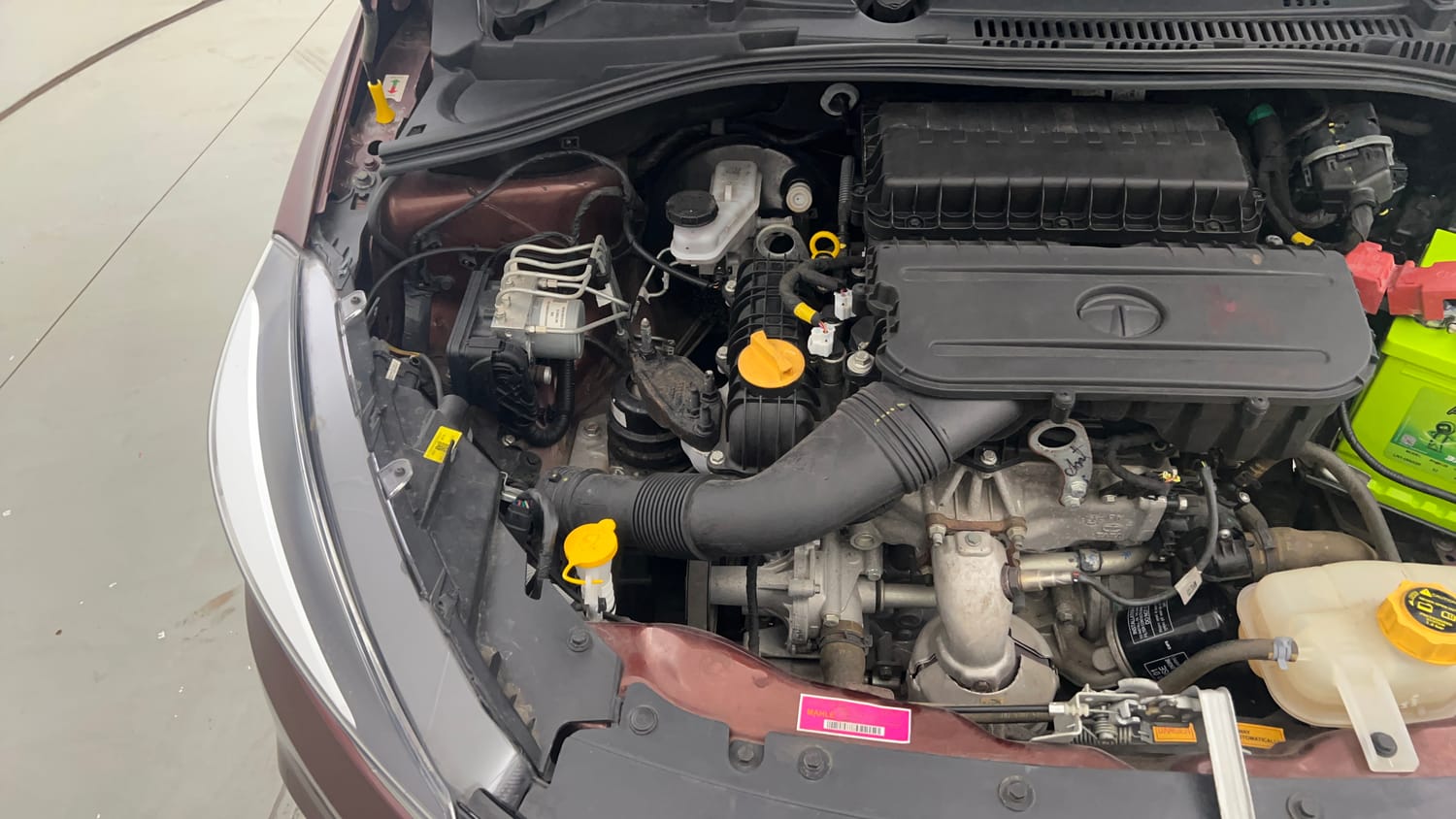 Used 2023 Tata Tigor XZA Plus Leatherette Pack Petrol Automatic engine ENGINE RIGHT SIDE VIEW