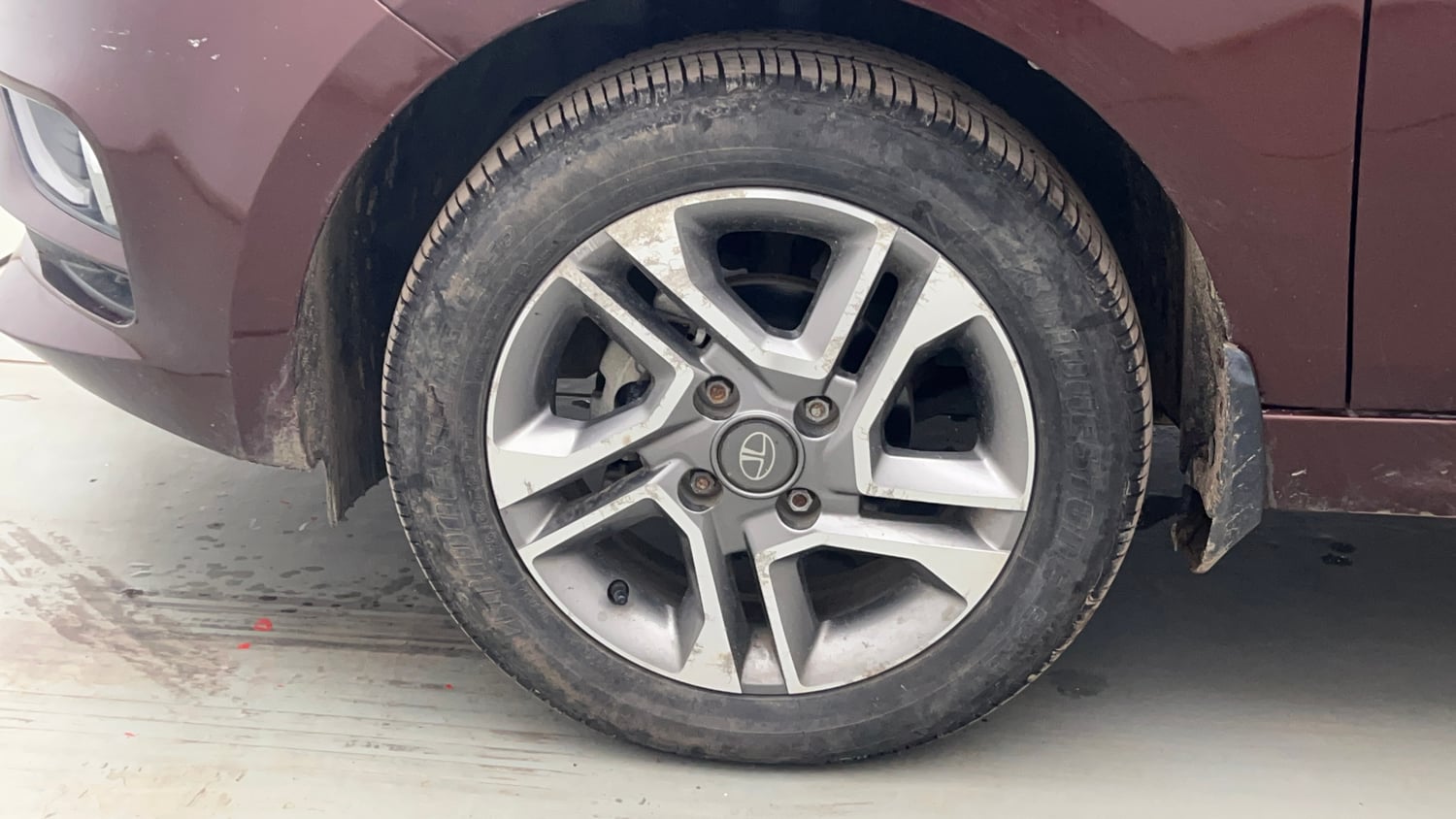 Used 2023 Tata Tigor XZA Plus Leatherette Pack Petrol Automatic tyres LEFT FRONT TYRE RIM VIEW