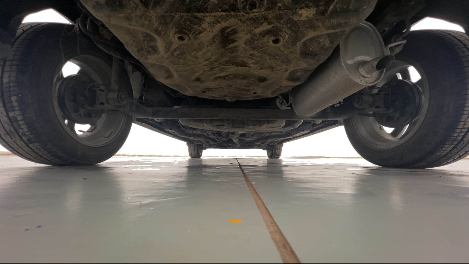 Used 2023 Tata Tigor XZA Plus Leatherette Pack Petrol Automatic extra REAR UNDERBODY VIEW (TAKEN FROM REAR)