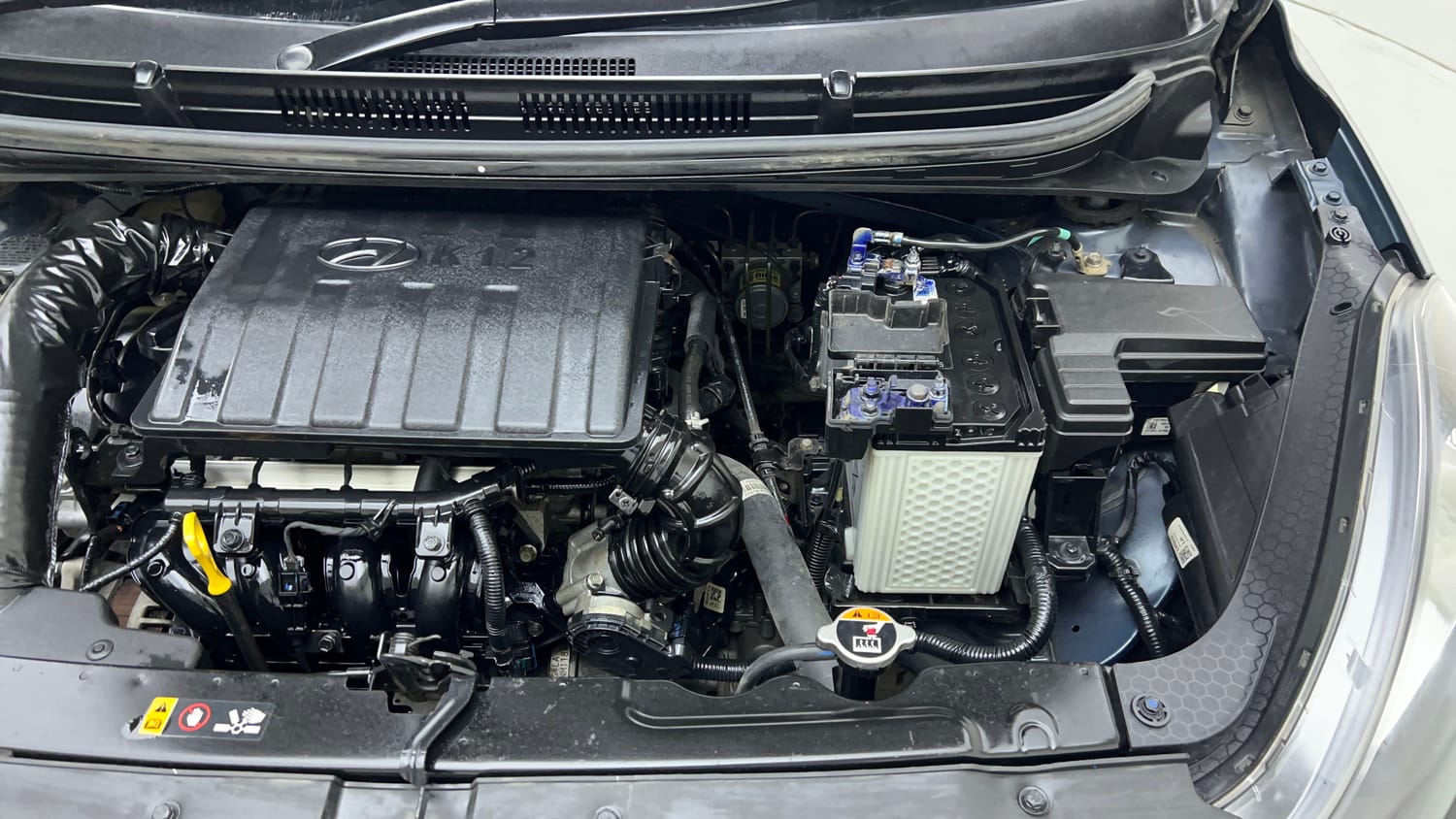 Used 2022 Hyundai Grand i10 Nios Sportz 1.2 Kappa VTVT Petrol Manual engine ENGINE LEFT SIDE VIEW