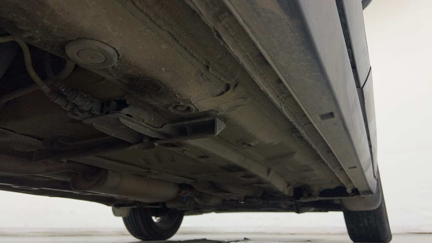 Used 2022 Volkswagen Taigun Topline 1.0 TSI AT Petrol Automatic extra REAR RIGHT UNDERBODY VIEW