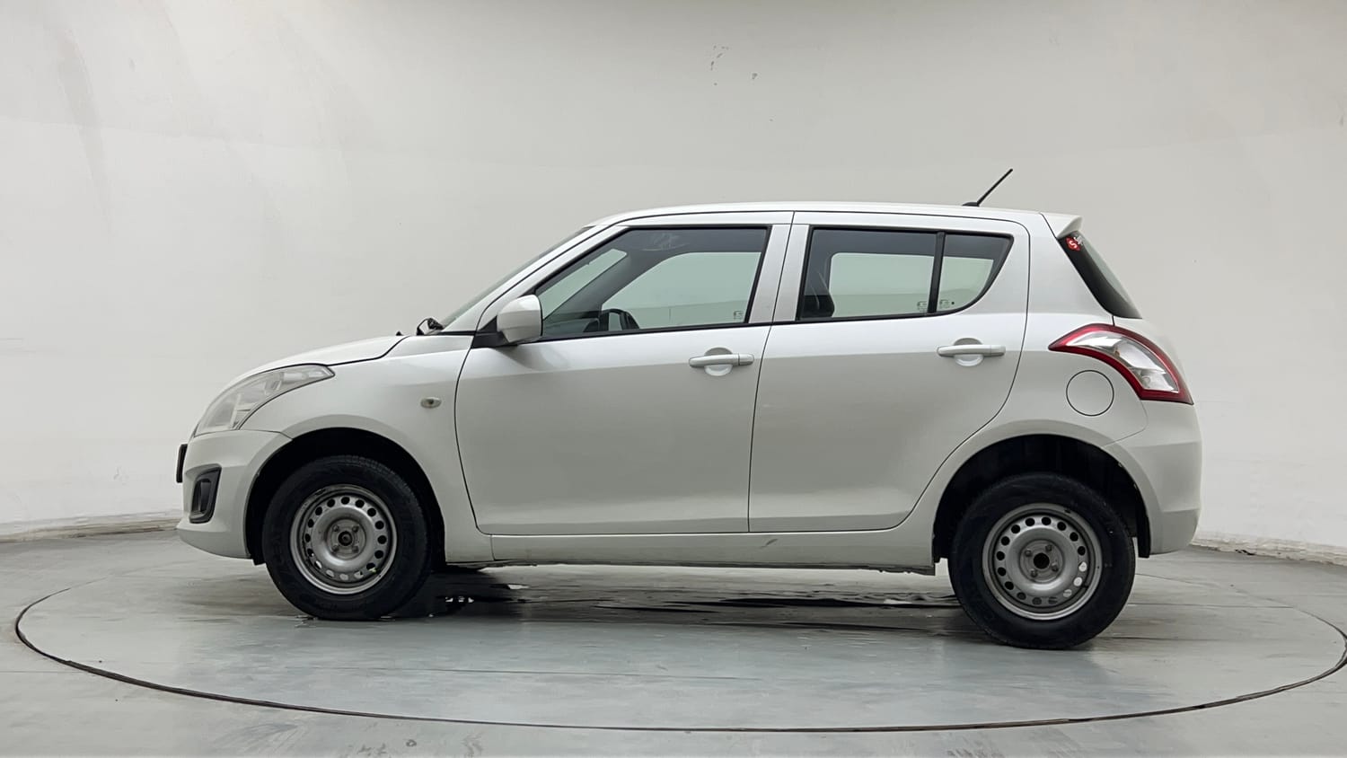 Used 2015 Maruti Suzuki Swift Lxi (O) Petrol Manual exterior LEFT SIDE VIEW