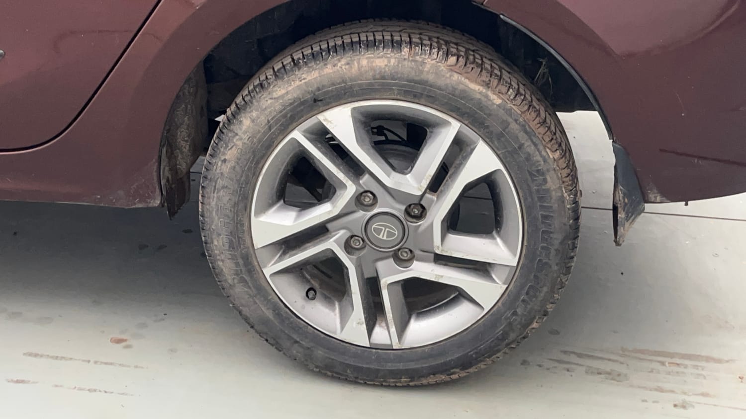 Used 2023 Tata Tigor XZA Plus Leatherette Pack Petrol Automatic tyres LEFT REAR TYRE RIM VIEW