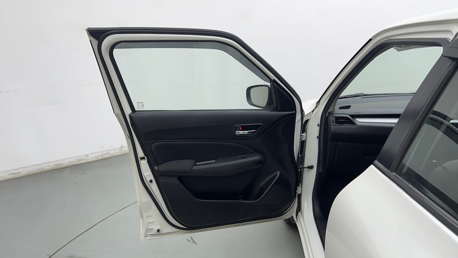 Used 2021 Maruti Suzuki Swift VXi Petrol Manual interior LEFT FRONT DOOR OPEN VIEW