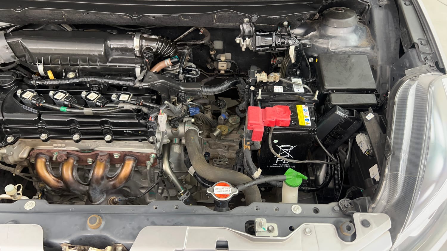 Used 2021 Maruti Suzuki Baleno Delta Petrol Manual engine ENGINE LEFT SIDE VIEW