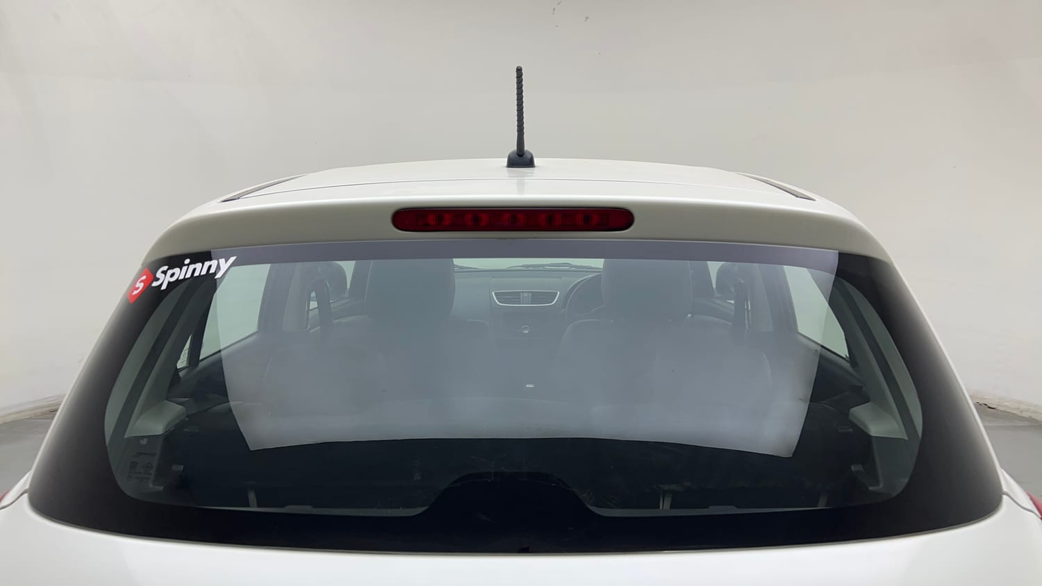 Used 2015 Maruti Suzuki Swift Lxi (O) Petrol Manual exterior BACK WINDSHIELD VIEW