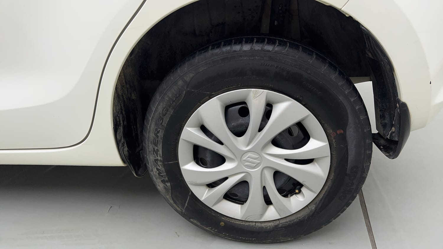 Used 2021 Maruti Suzuki Swift VXi Petrol Manual tyres LEFT REAR TYRE RIM VIEW