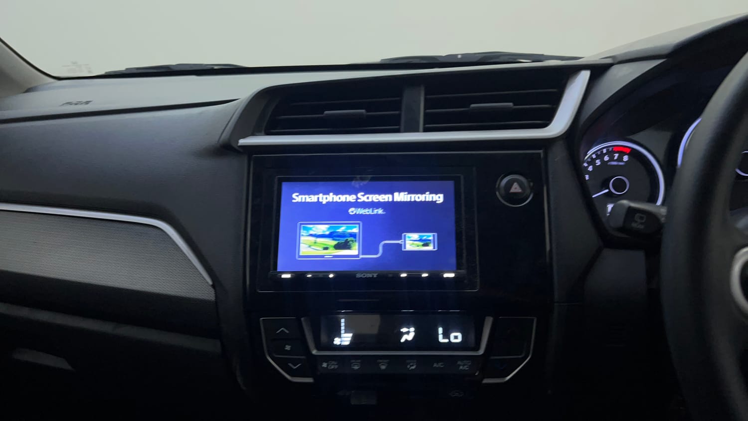 Used 2018 Honda BR-V V CVT Petrol Petrol Automatic top_features Integrated (in-dash) music system