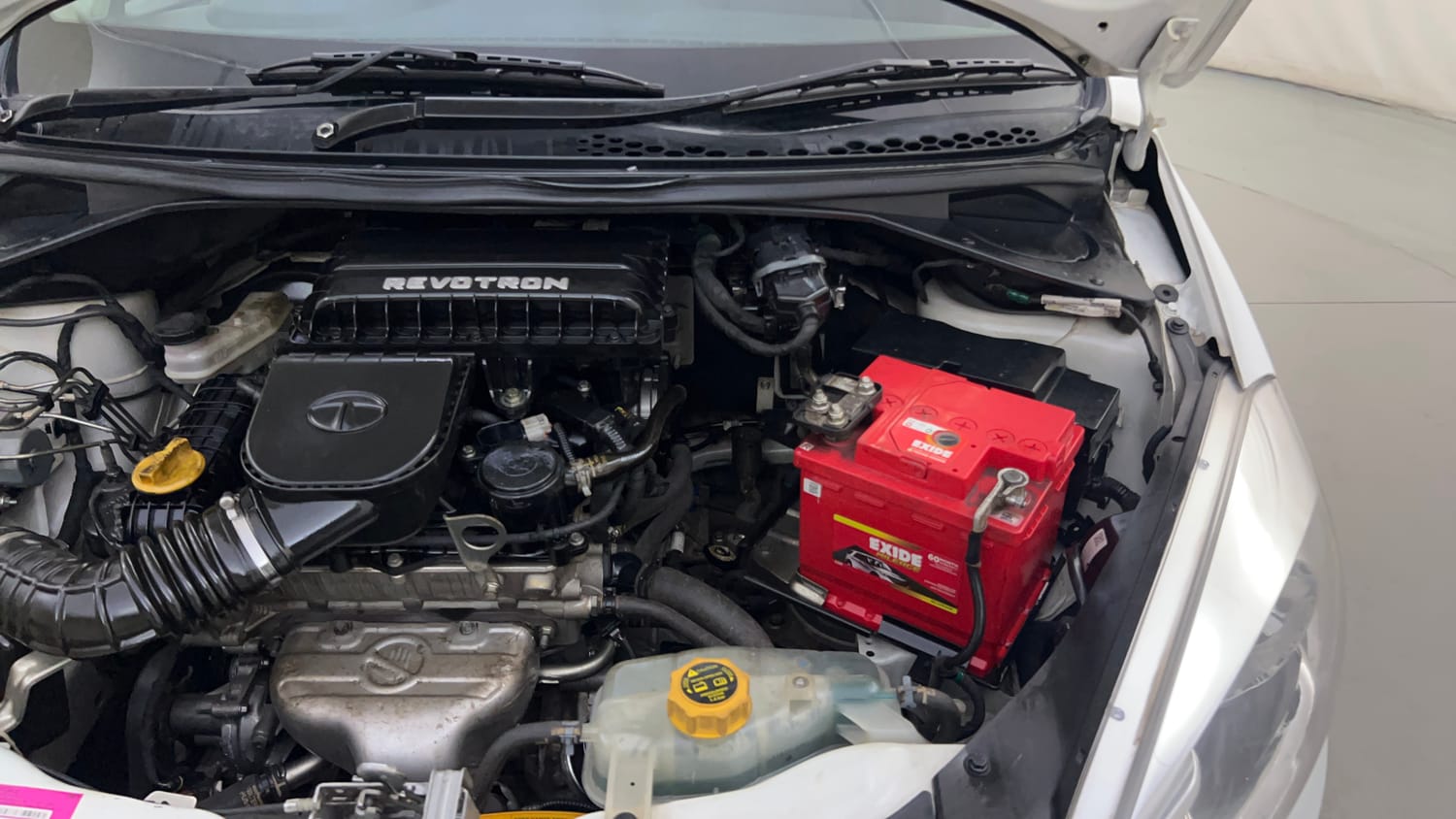 Used 2018 Tata Tiago Revotron XZ Petrol Manual engine ENGINE LEFT SIDE HINGE & APRON VIEW