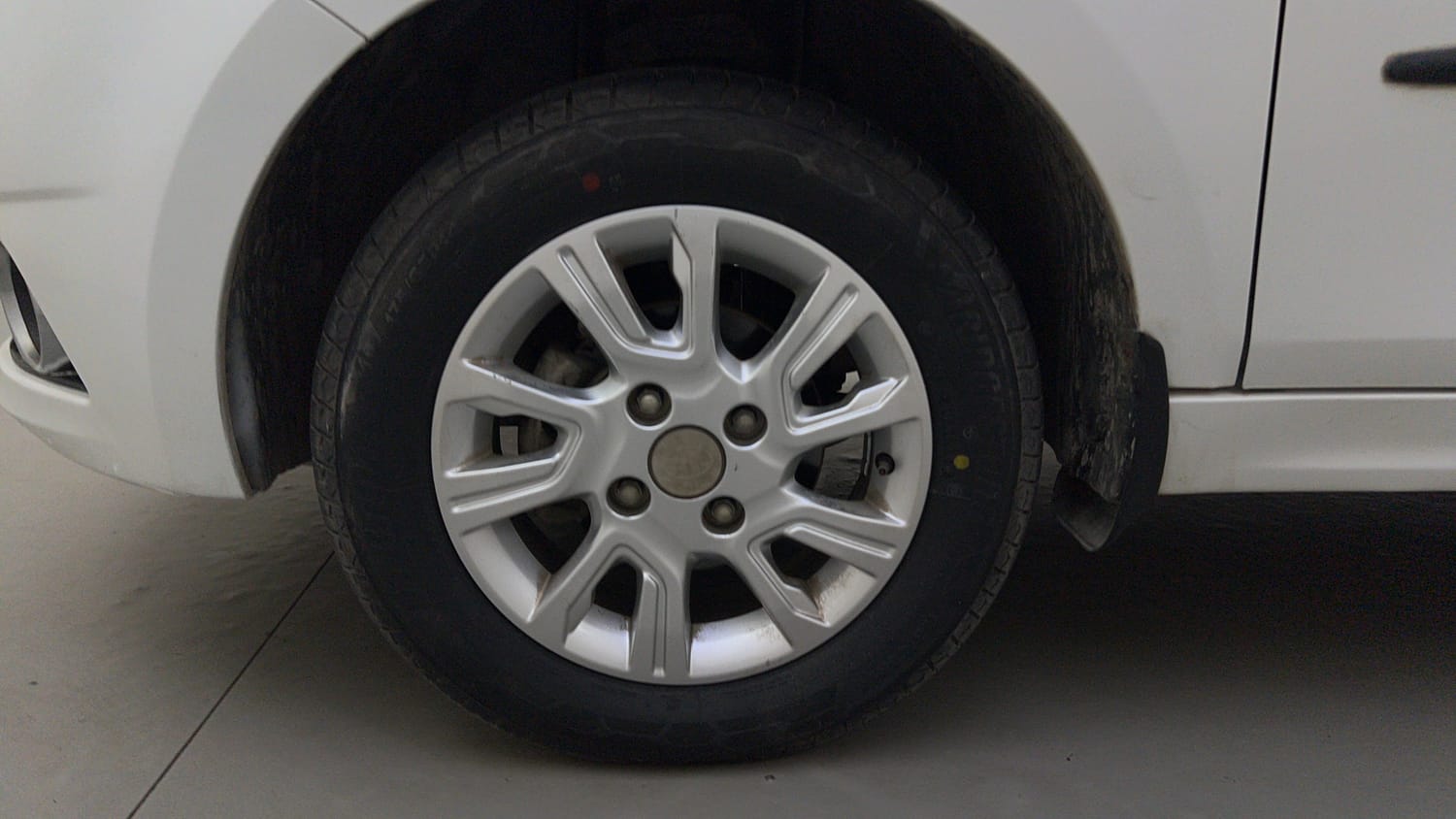 Used 2018 Tata Tiago Revotron XZ Petrol Manual tyres LEFT FRONT TYRE RIM VIEW