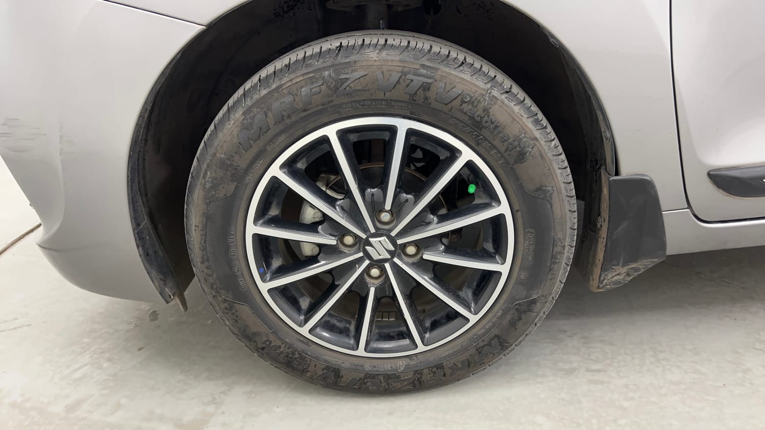 Used 2021 Maruti Suzuki Baleno Delta Petrol Manual tyres LEFT FRONT TYRE RIM VIEW