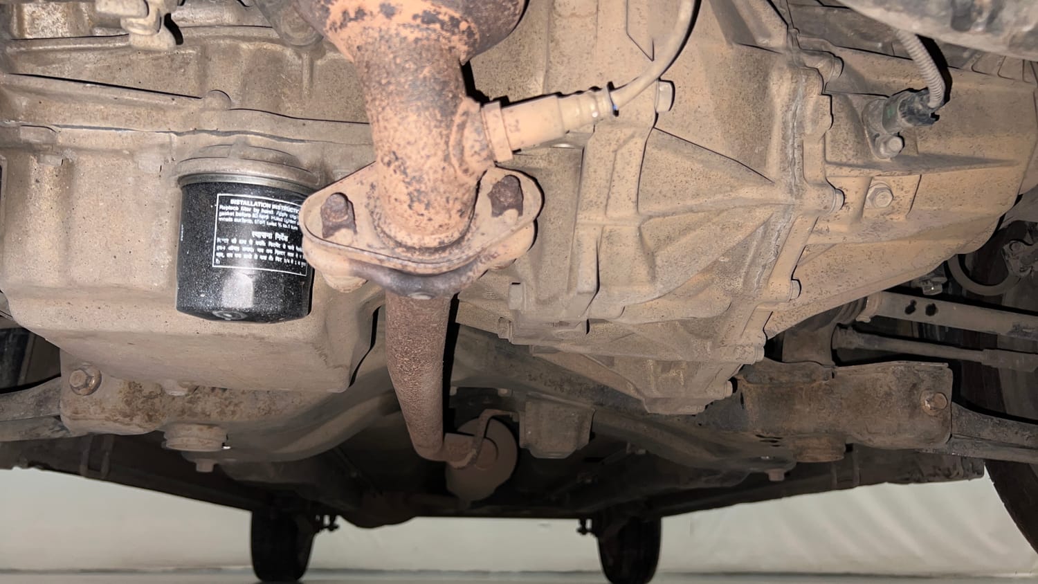 Used 2016 Maruti Suzuki Wagon R 1.0 VXI AMT Petrol Automatic extra FRONT LEFT UNDERBODY VIEW