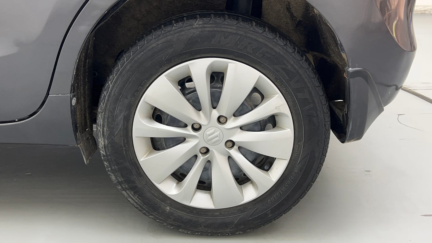 Used 2017 Maruti Suzuki Baleno Delta 1.2 Petrol Manual tyres LEFT REAR TYRE RIM VIEW