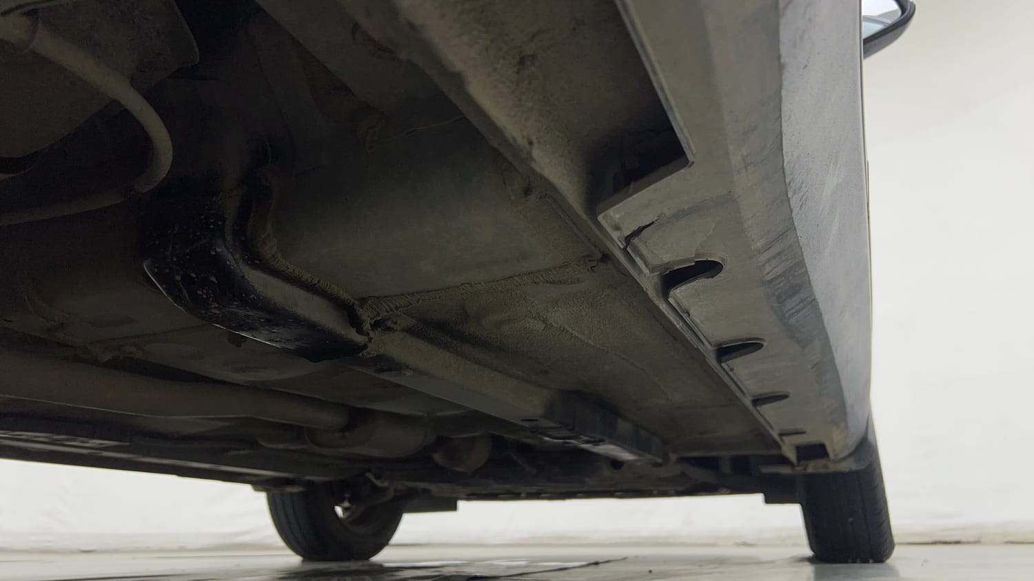 Used 2023 Hyundai Exter SX (O) Connect 1.2 AMT Petrol Automatic extra REAR RIGHT UNDERBODY VIEW
