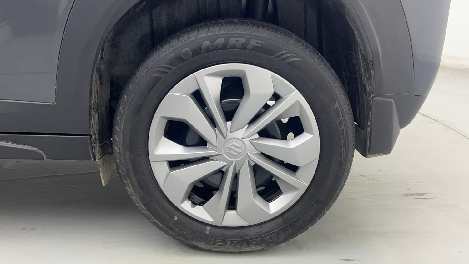 Used 2025 Maruti Suzuki Fronx Sigma 1.2L MT Petrol Manual tyres LEFT REAR TYRE RIM VIEW