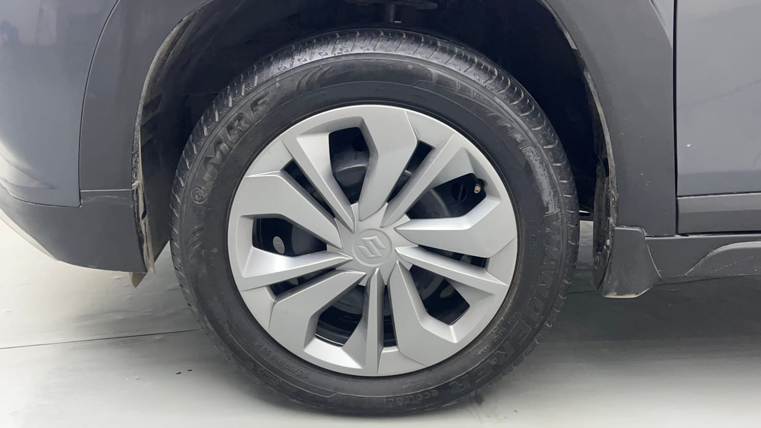 Used 2025 Maruti Suzuki Fronx Sigma 1.2L MT Petrol Manual tyres LEFT FRONT TYRE RIM VIEW