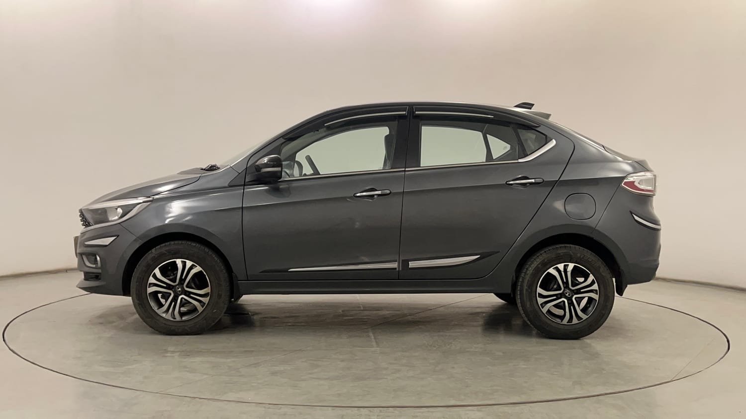 Used 2023 Tata Tigor XZ Plus CNG Cng Manual exterior LEFT SIDE VIEW