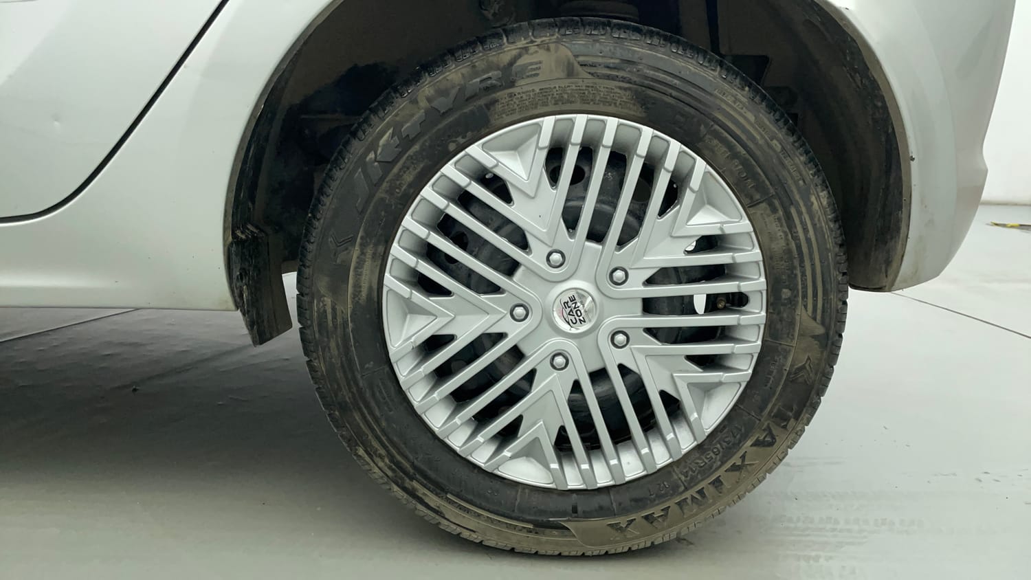Used 2016 Tata Tiago Revotron XT Petrol Manual tyres LEFT REAR TYRE RIM VIEW