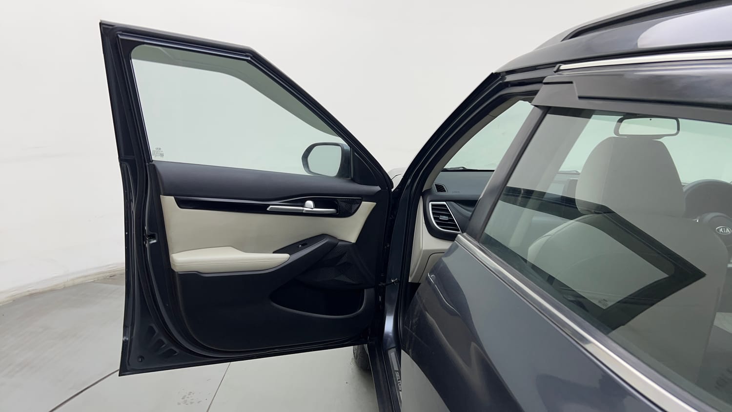 Used 2020 Kia Seltos HTX 1.5 Petrol Manual interior LEFT FRONT DOOR OPEN VIEW