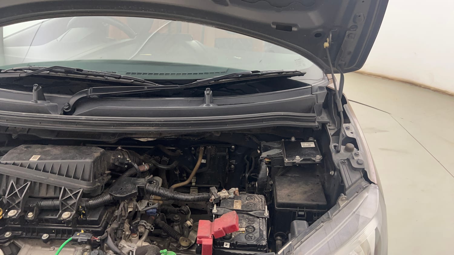 Used 2022 Maruti Suzuki Wagon R VXI 1.0 Petrol Manual engine ENGINE LEFT SIDE HINGE & APRON VIEW