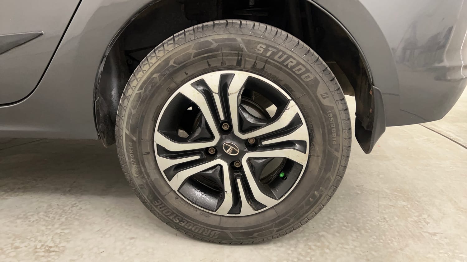Used 2023 Tata Tigor XZ Plus CNG Cng Manual tyres LEFT REAR TYRE RIM VIEW