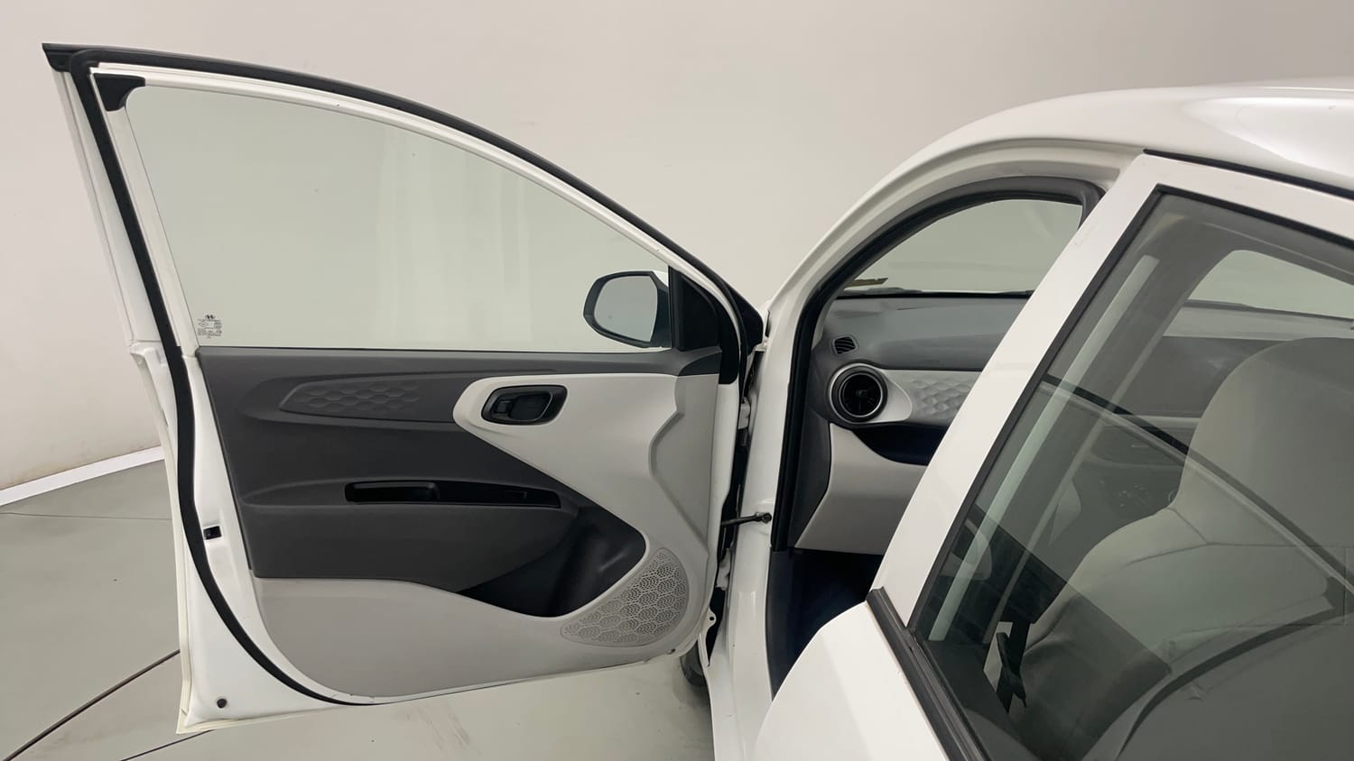 Used 2021 Hyundai Grand i10 Nios Magna Corporate Edition 1.2 Kappa VTVT Petrol Manual interior LEFT FRONT DOOR OPEN VIEW