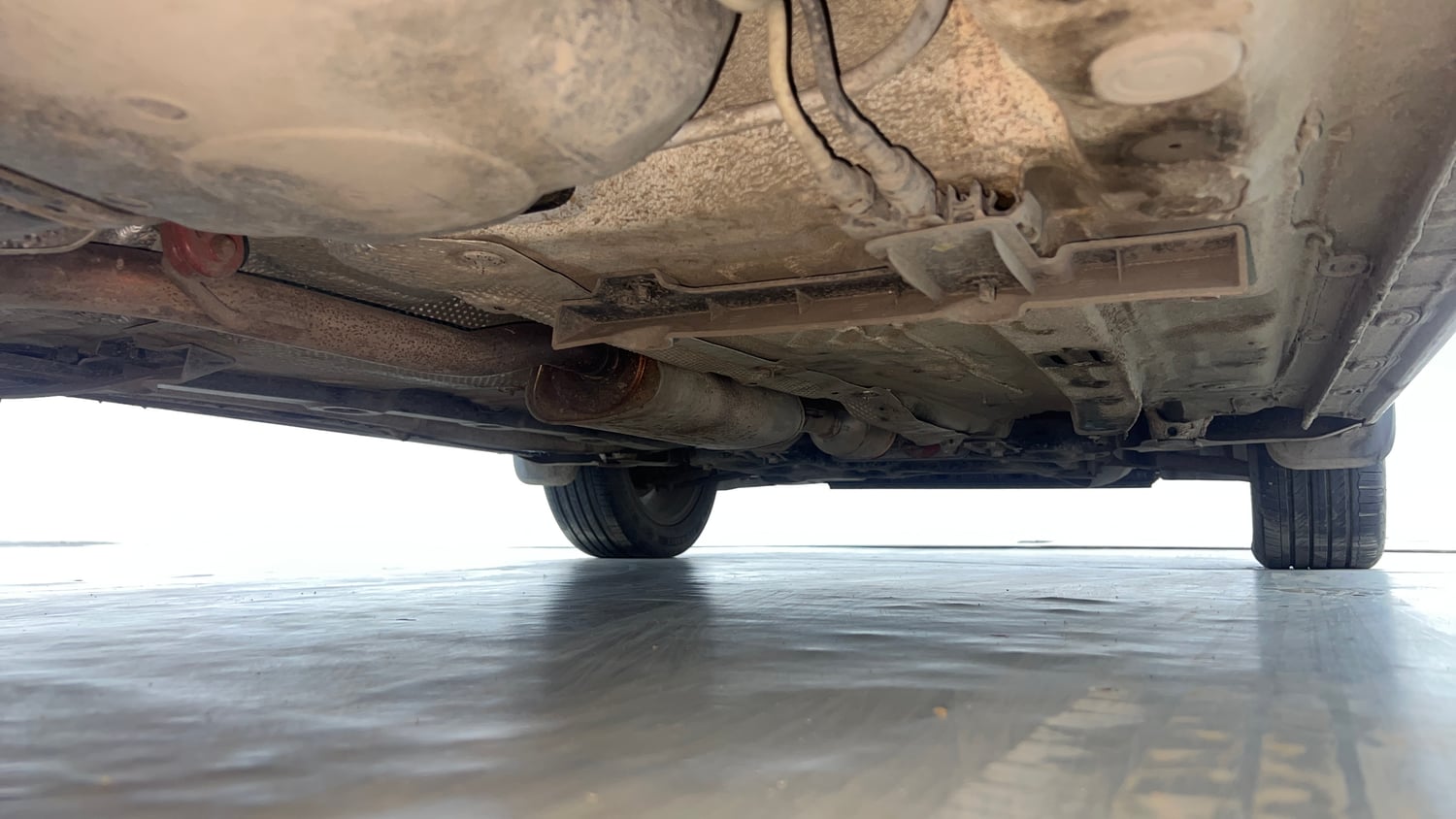 Used 2022 Volkswagen Virtus Topline 1.0 TSI AT Petrol Automatic extra REAR RIGHT UNDERBODY VIEW