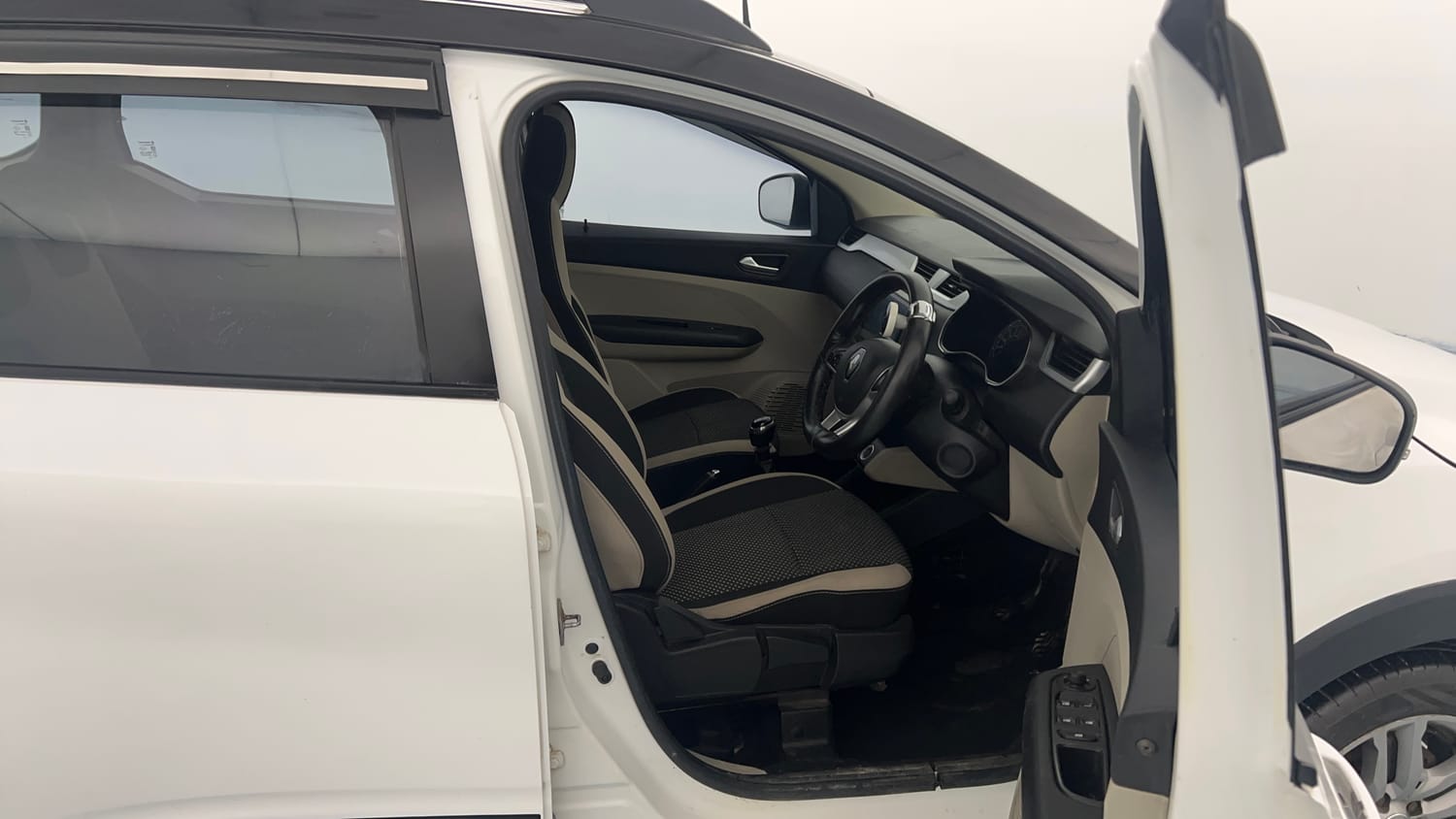 Used 2023 Renault Triber RXZ Dual Tone Petrol Manual interior RIGHT SIDE FRONT DOOR CABIN VIEW