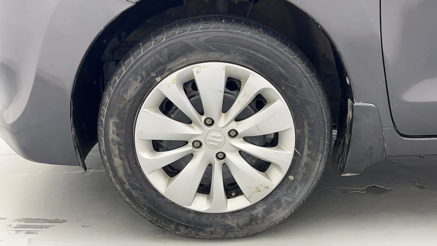 Used 2017 Maruti Suzuki Baleno Delta 1.2 Petrol Manual tyres LEFT FRONT TYRE RIM VIEW