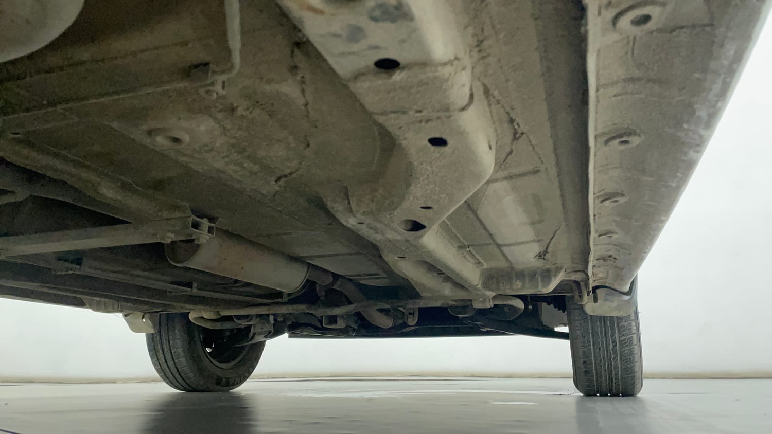 Used 2016 Tata Tiago Revotron XT Petrol Manual extra REAR RIGHT UNDERBODY VIEW
