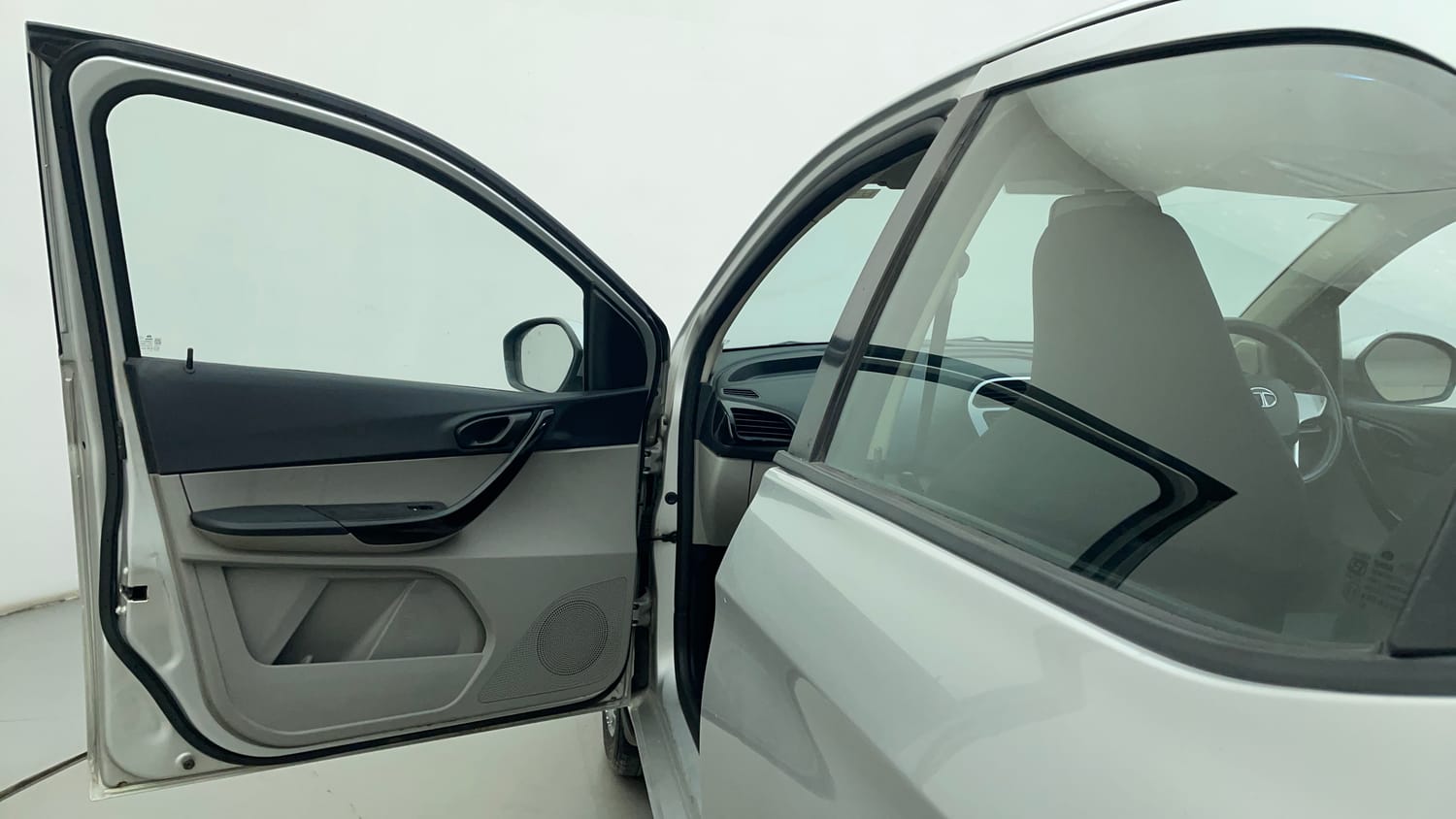 Used 2016 Tata Tiago Revotron XT Petrol Manual interior LEFT FRONT DOOR OPEN VIEW