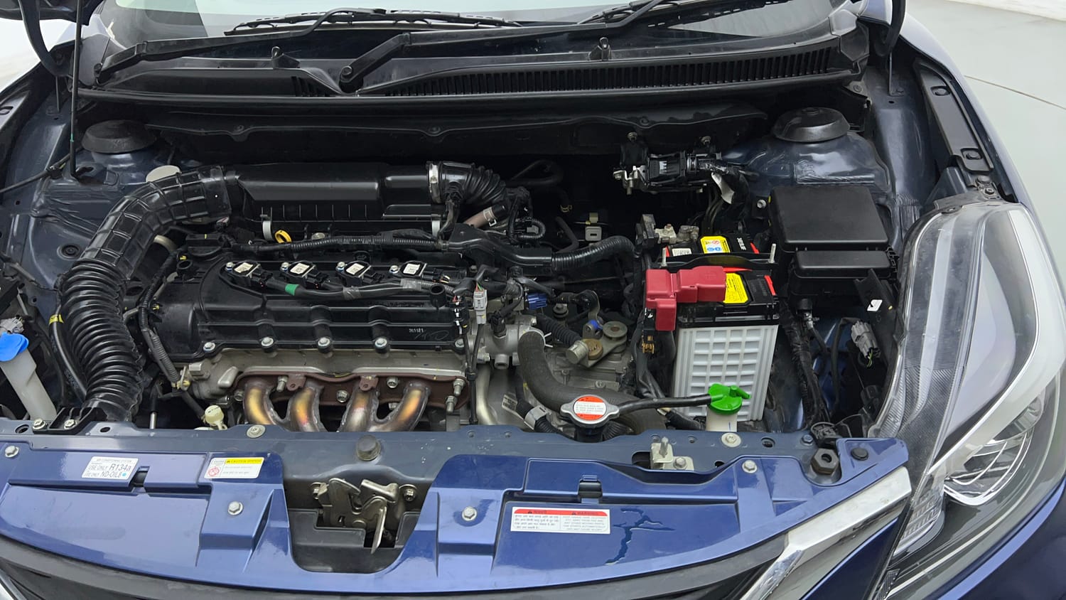 Used 2022 Maruti Suzuki Baleno Delta Petrol Manual engine ENGINE LEFT SIDE VIEW