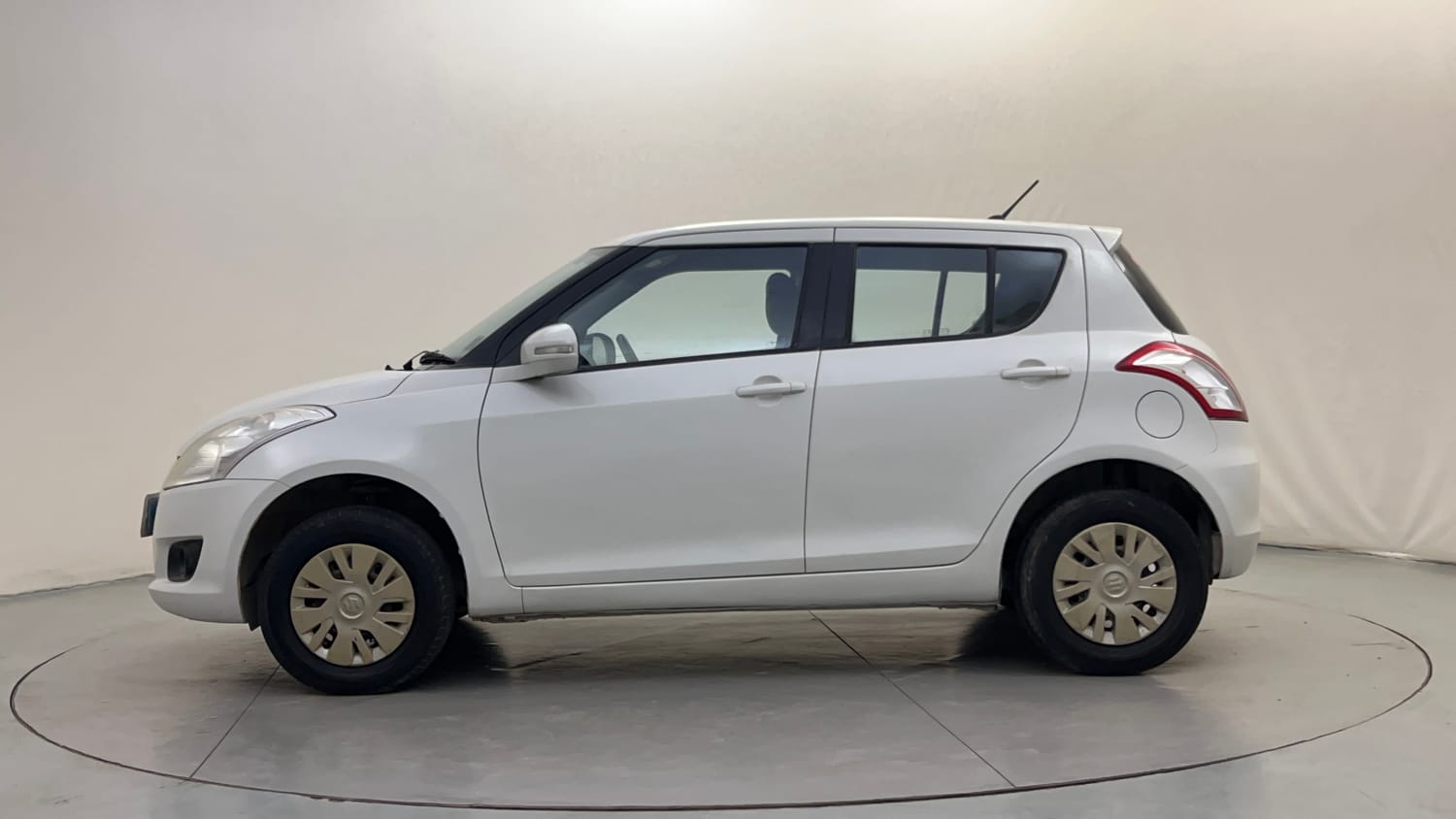 Used 2012 Maruti Suzuki Swift VXi Petrol Manual exterior LEFT SIDE VIEW