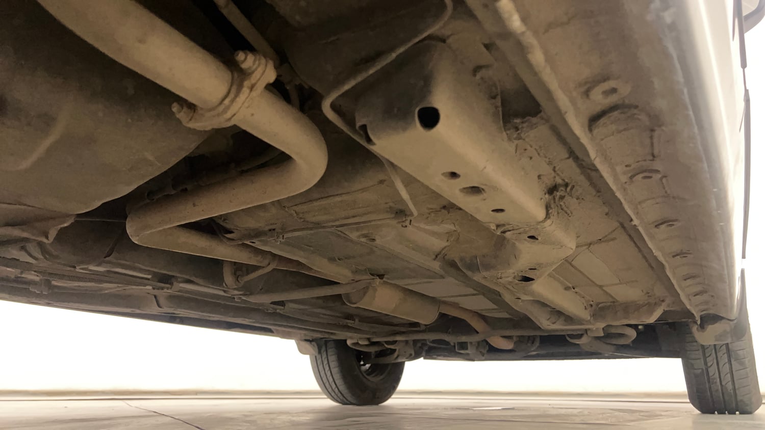Used 2023 Tata Tigor XZ Plus CNG Cng Manual extra REAR RIGHT UNDERBODY VIEW