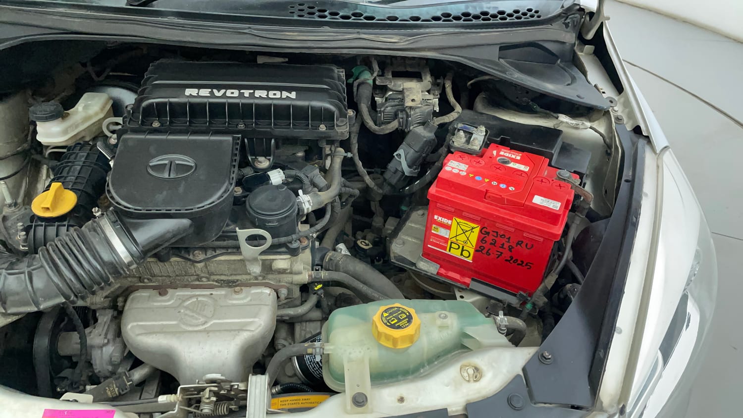 Used 2016 Tata Tiago Revotron XT Petrol Manual engine ENGINE LEFT SIDE VIEW