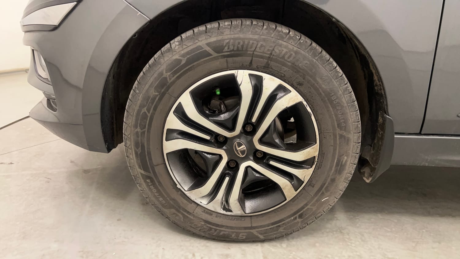 Used 2023 Tata Tigor XZ Plus CNG Cng Manual tyres LEFT FRONT TYRE RIM VIEW