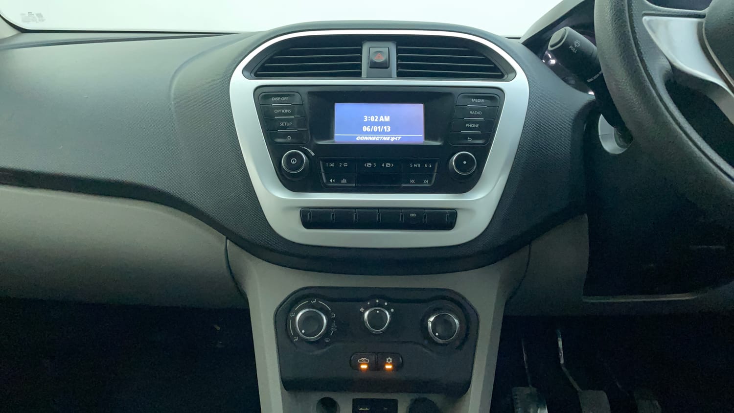 Used 2016 Tata Tiago Revotron XT Petrol Manual interior MUSIC SYSTEM & AC CONTROL VIEW