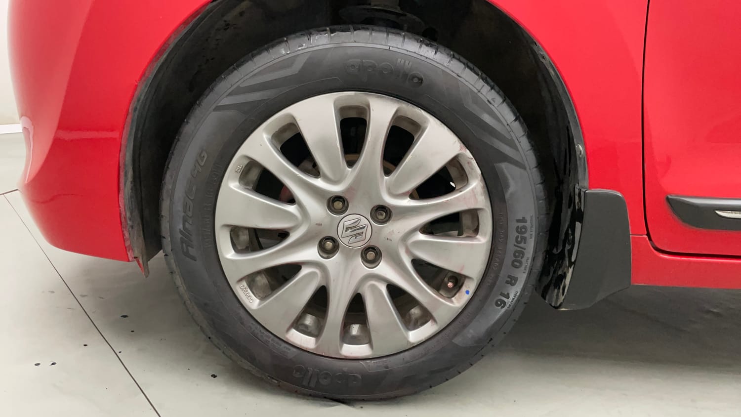 Used 2017 Maruti Suzuki Baleno Zeta 1.2 Petrol Manual tyres LEFT FRONT TYRE RIM VIEW