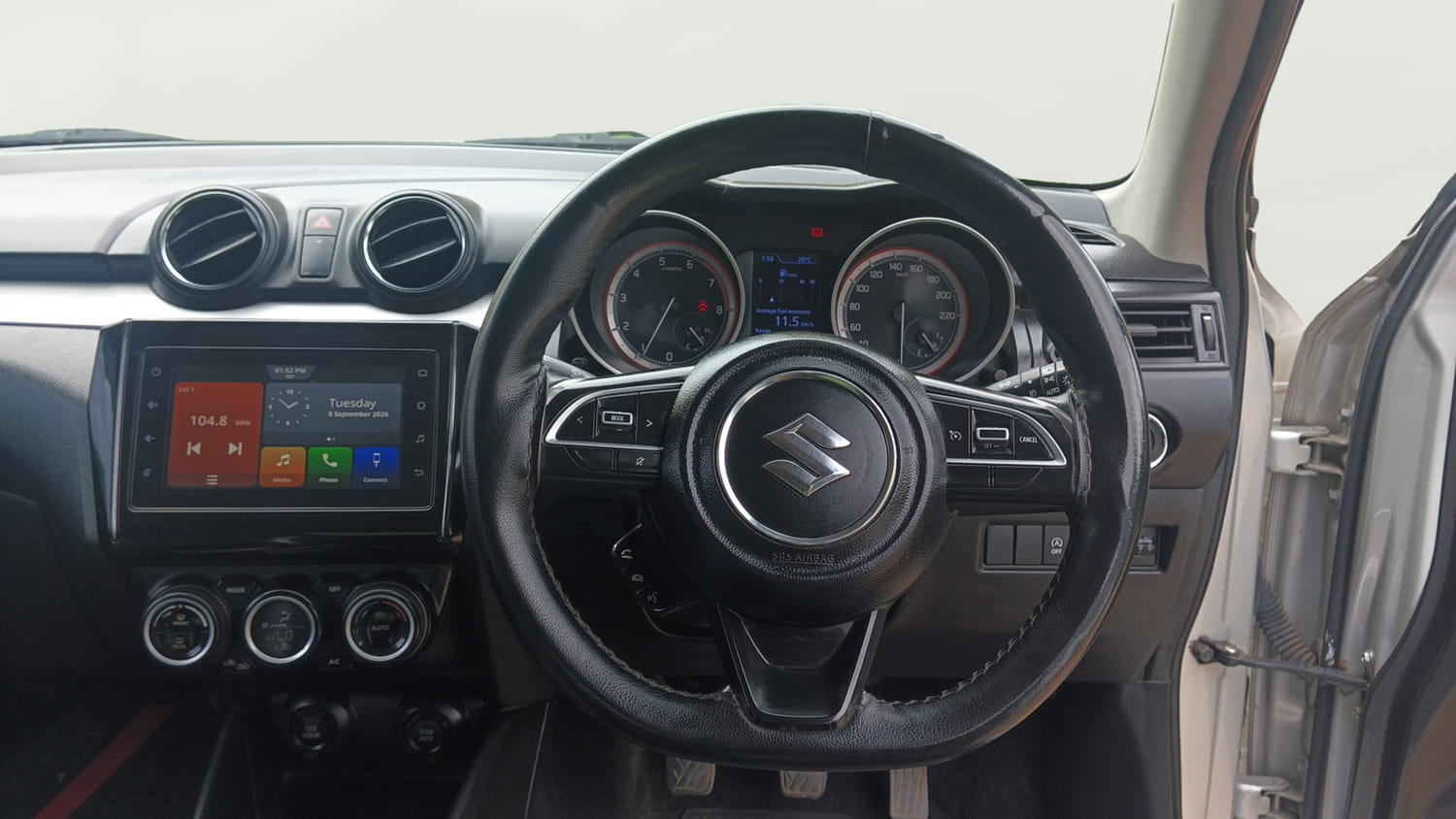 Used 2021 Maruti Suzuki Swift ZXi Plus Petrol Manual interior STEERING VIEW