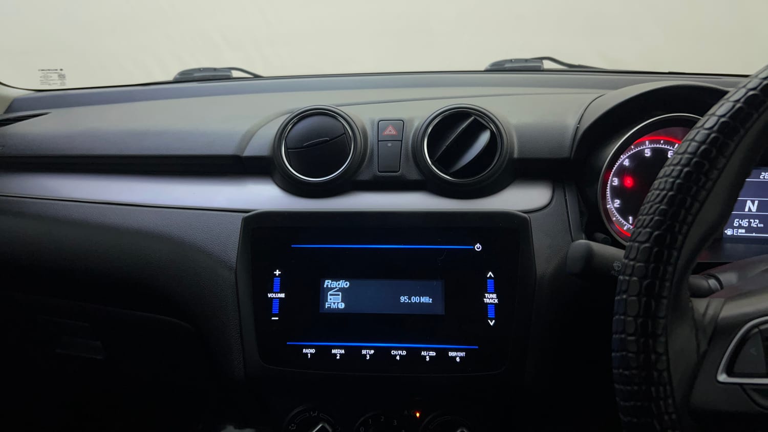 Used 2022 Maruti Suzuki Swift VXi AMT Petrol Automatic top_features Integrated (in-dash) music system