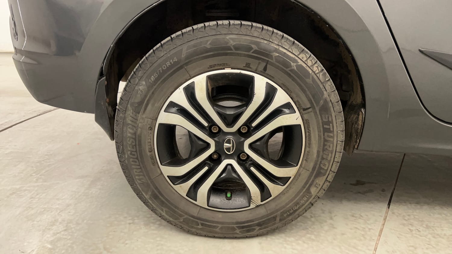 Used 2023 Tata Tigor XZ Plus CNG Cng Manual tyres RIGHT REAR TYRE RIM VIEW